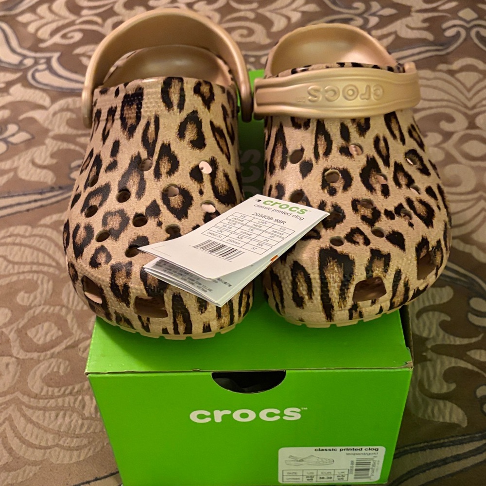 Brand new with tags CROCS Animal Print Clogs with Tan Accents